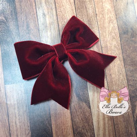 dark red christmas bows|More.